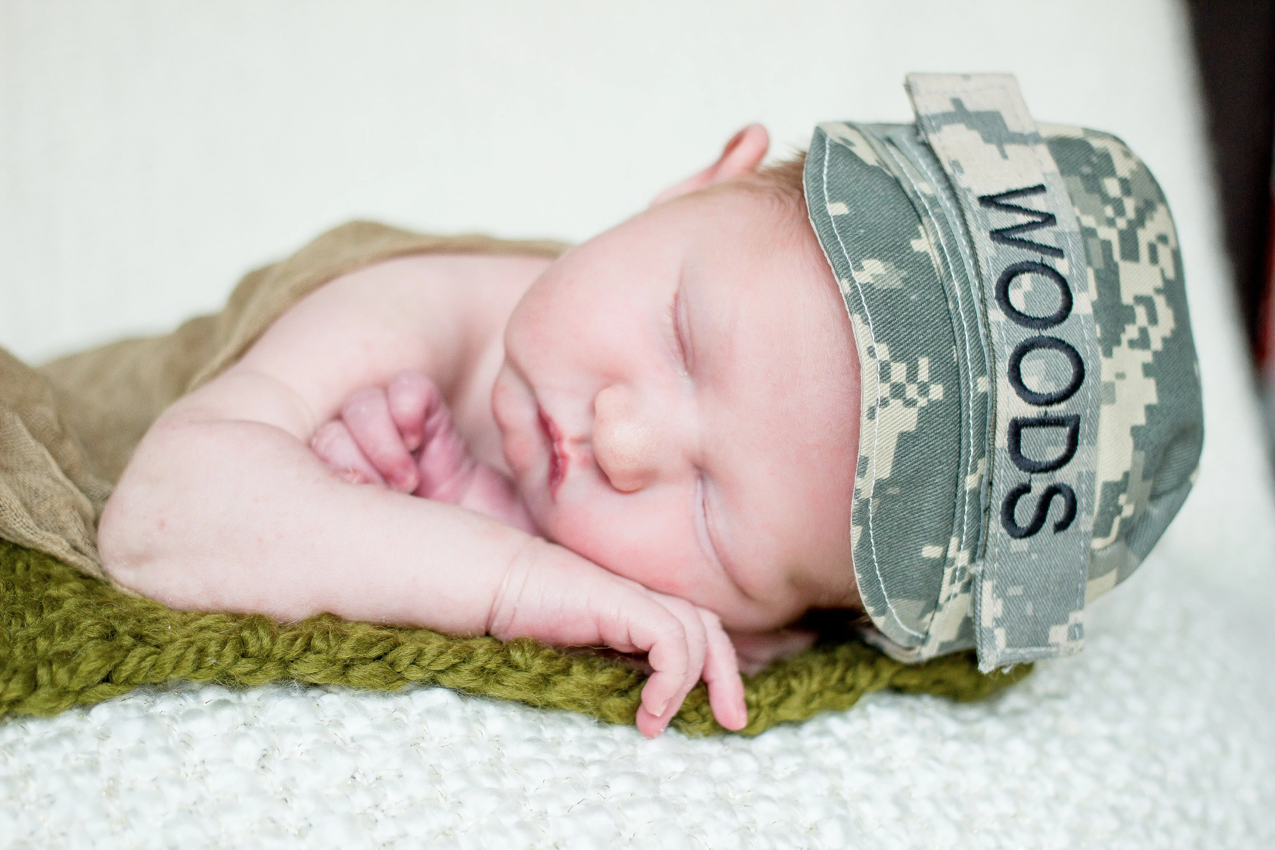 Olive green newborn baby layering bump blanket